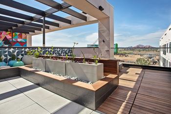 Rooftop Indoor-Outdoor Entertainment Area With Kitchen, TV, Fire Pit and Grills